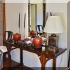 F33. Asian console table. 32”h x 65”w x 19.5”d 